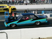 Blue and Black Pontaic Grand Prix Drag Car